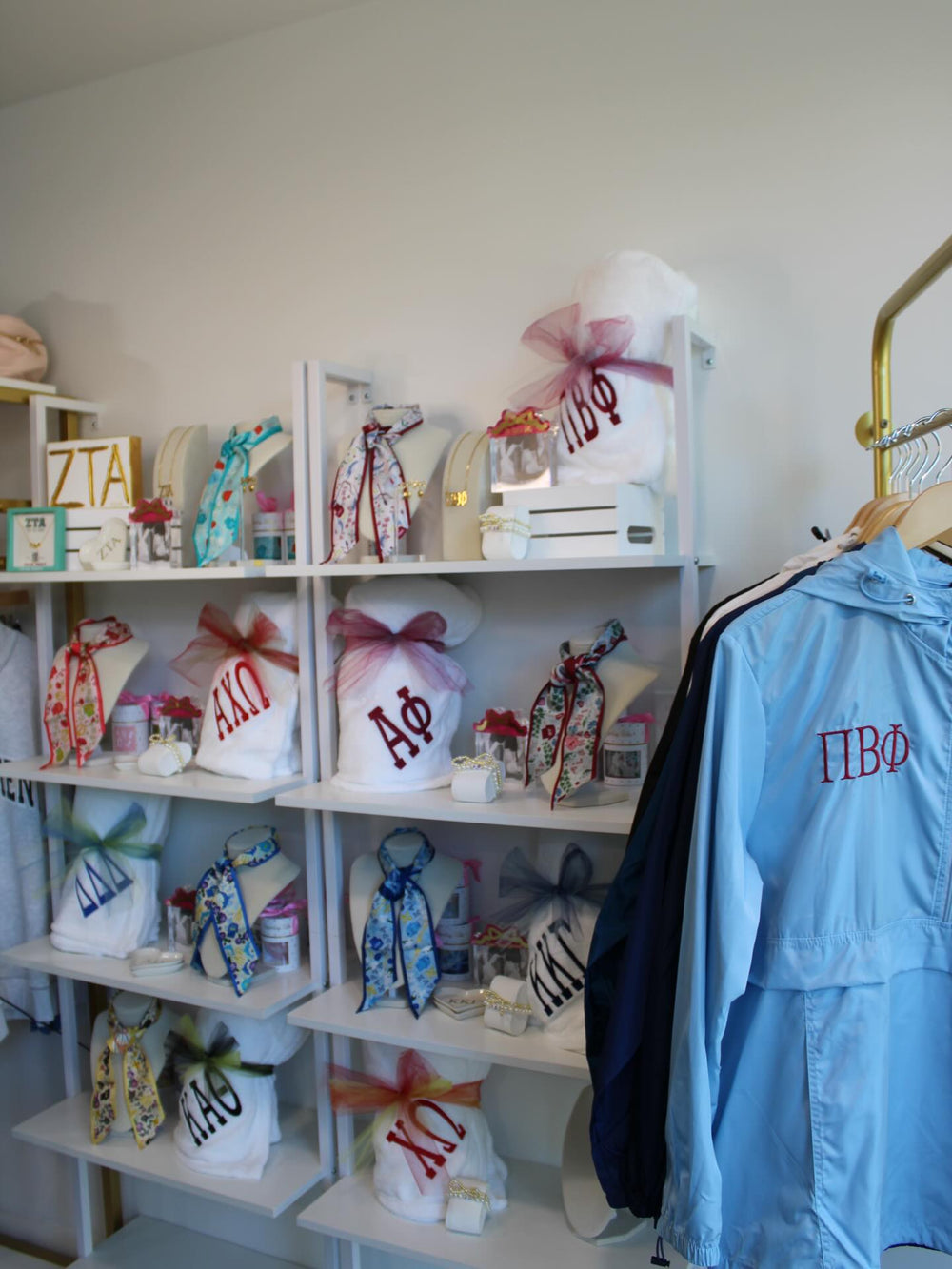 Sorority accessories on the shelf at a downtown waco & online boutique